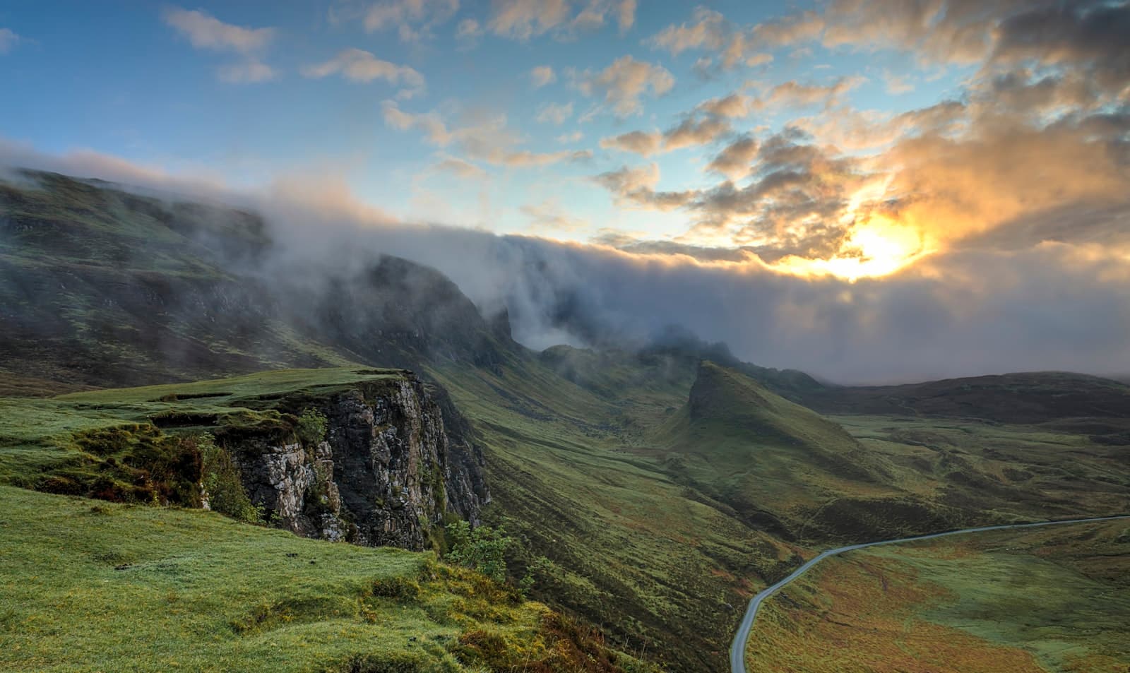 Misty mountain landscape representing outdoor hiking areas where EPA-registered tick repellents should be applied